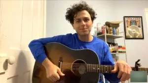 man playing guitar
