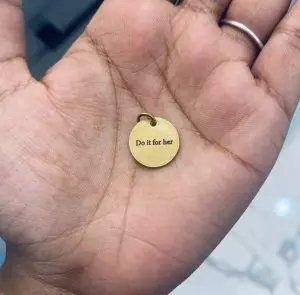 Image of a pendant that says do it for her
